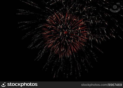 Colorful fireworks on the black sky. Real Fireworks on Deep Black Background Sky on Fireworks festival show before The independence day on 4 of July. Real Fireworks on Deep Black Background Sky on Fireworks festival show before The independence day on 4 of July. Colorful fireworks on the black sky