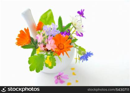 Colorful flower arrangement in white mortar with marigold isolated on white