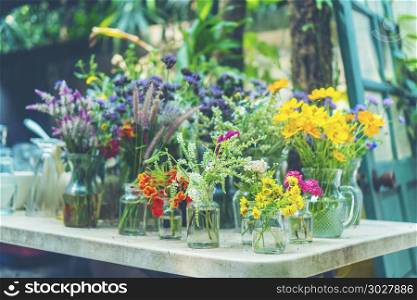 colorful flower on outdoor coffee table
