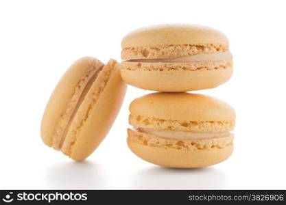 Colorful French Macarons on the white background.