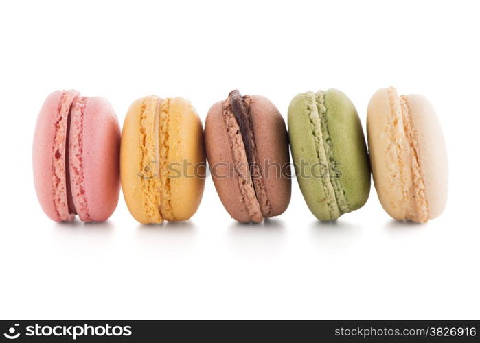 Colorful French Macarons on the white background.