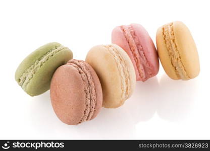 Colorful French Macarons on the white background.