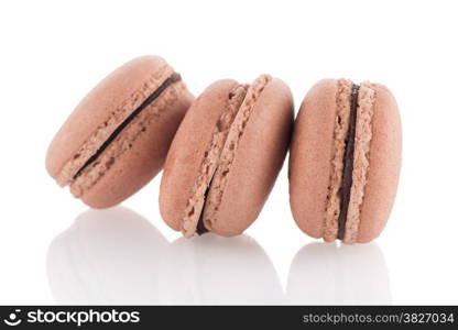 Colorful French Macarons on the white background.