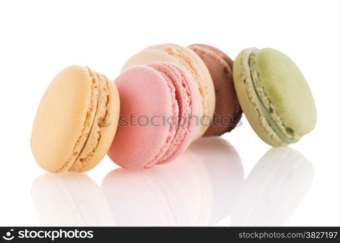 Colorful French Macarons on the white background.