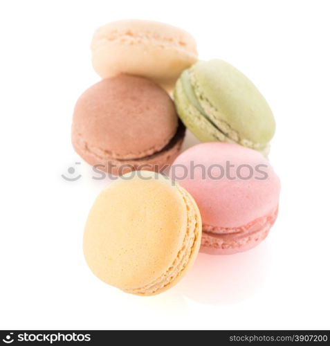 Colorful French Macarons on the white background.