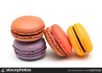 Colorful fresh macarons isolated on white background