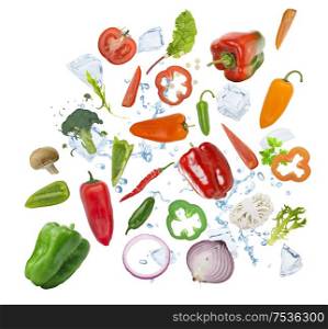 Colorful fresh vegetables with ice cubes isolated on white background