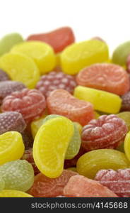 colorful fruit flavored candies assortment on a white background