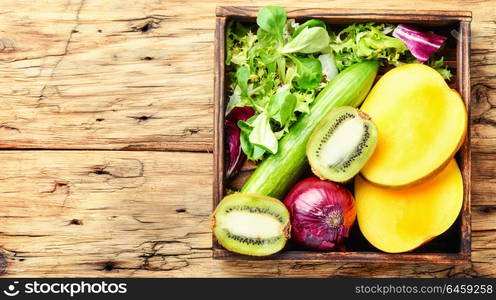 Colorful fruits and vegetables. Composition with fresh fruits and vegetables. Detox diet.Healthy eating.