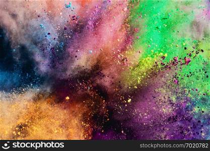 Colorful holi powder explosion background. Holiday celebration, festival.. Colorful holi powder explosion.