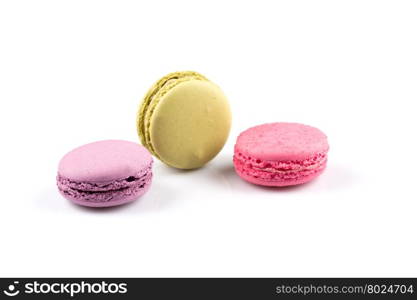 Colorful homemade macaroons on a white background