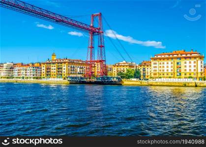 Colorful illustration of Vizcaya Bridge, a transporter bridge that links the towns of Portugalete and Getxo, Spain, built in 1893, declared a World Heritage Site by UNESCO