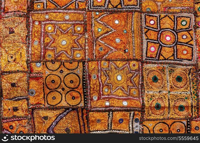 Colorful indian fabric textile texture background. India