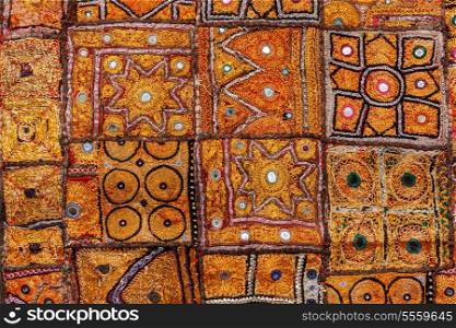 Colorful indian fabric textile texture background. India