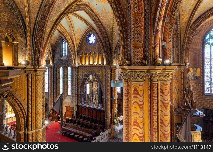 Colorful interior of Matthias Church in Buda&rsquo;s Castle District of Budapest, Hungary. Interior Matthias Church in Buda&rsquo;s Castle District of Budapest, Hungary