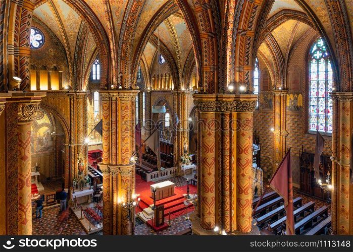 Colorful interior of Matthias Church in Buda&rsquo;s Castle District of Budapest, Hungary. Interior Matthias Church in Buda&rsquo;s Castle District of Budapest, Hungary