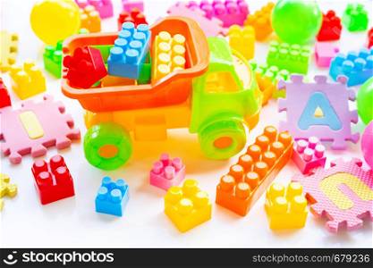 Colorful Kids toys on white background.