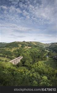 Colorful landscape image of Headstone Viaduct and Monsal Head in. Landscape image of Headstone Viaduct and Monsal Head in Peak District in Summer