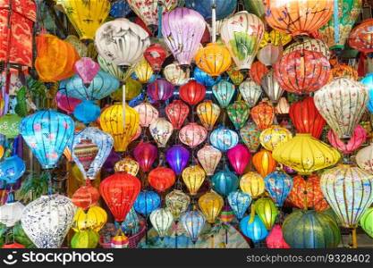 Colorful lanterns at night market in Hoi An ancient town in central Vietnam, landmark and popular for tourist attractions. Vietnam and Southeast Asia travel concept