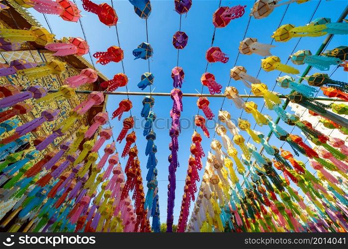 Colorful lanterns or lamps in travel trip and holidays vacation concept. Traditional festival in Harikulchai Temple, Lamphun, Thailand. Traditional ceremony in Asia. Celebration