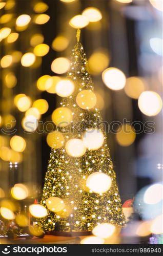 Colorful light Abstract circular bokeh of Christmas and happy new year background.