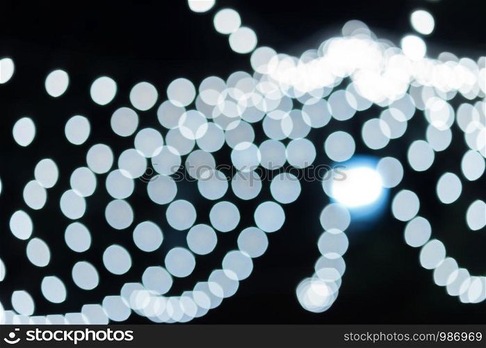 Colorful light bulb Abstract circular bokeh of Christmas and happy new year background.