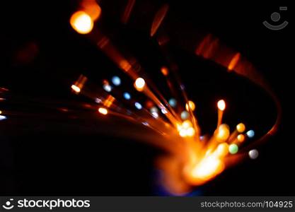 Colorful light explosion on black background. Futuristic wallpaper. Light explosion background