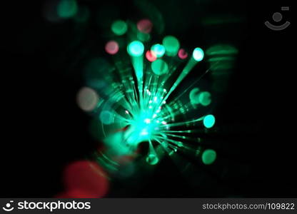 Colorful light explosion on black background. Futuristic wallpaper. Light explosion background