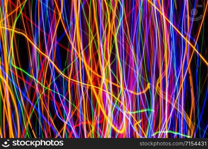 Colorful lights on the long exposure with motion background, Abstract glowing colorful lines, slow speed shutter