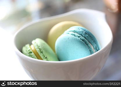 Colorful Macaron in close up isolated on white background