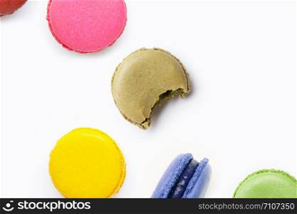 Colorful macarons isolated on white background.