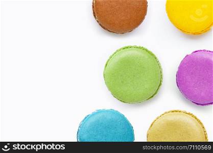 Colorful macarons isolated on white background.
