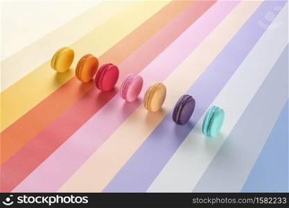 colorful macarons or macaroons dessert sweet beautiful with vintage pastel background.