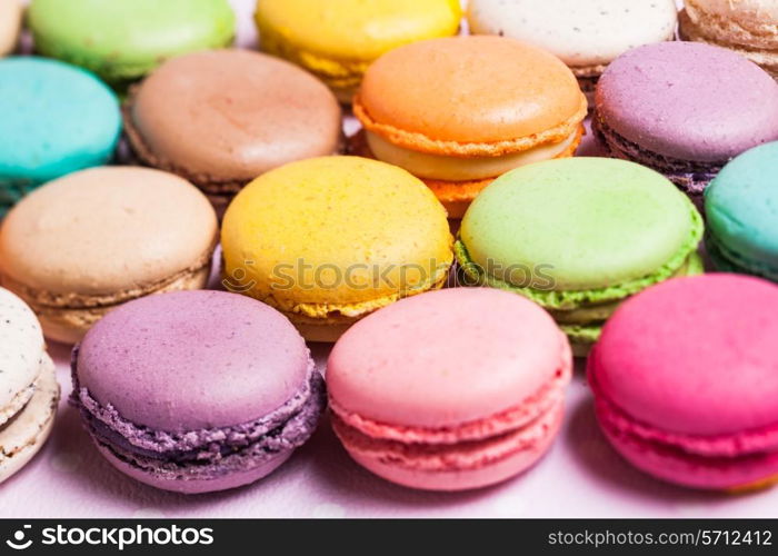 Colorful macaroons - french dessert as a background