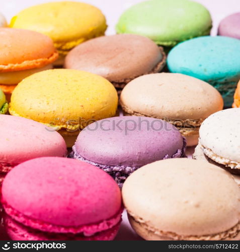 Colorful macaroons - french dessert as a background