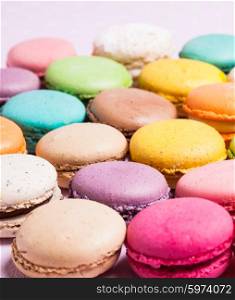 Colorful macaroons - french dessert as a background. The colorful macaroons