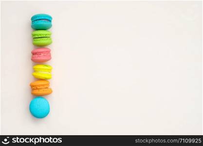 colorful macaroons on pink background, Sweet and tasty for cooking and restaurant menu, Dessert, Top view, Space to write. pastel colors, vintage card.