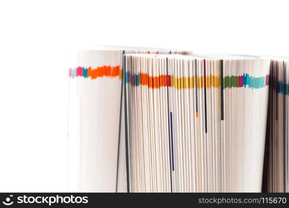 Colorful magazines close up photo - rolled up composition