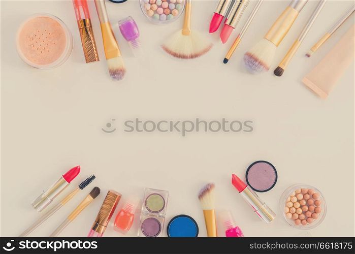 Colorful make up flat lay scene with copy space, retro toned. Colorful make up flat lay scene