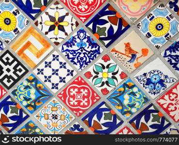 Colorful mexican talavera ceramic tiles wall decoration texture background.