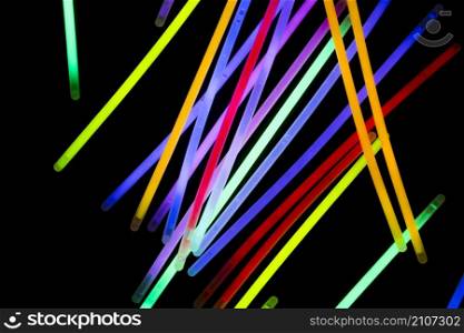 colorful neon tubes dark background