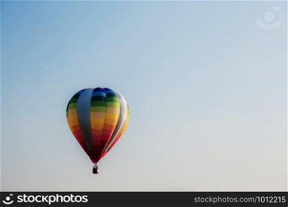 Colorful of balloon on the blue sky at sunlight.