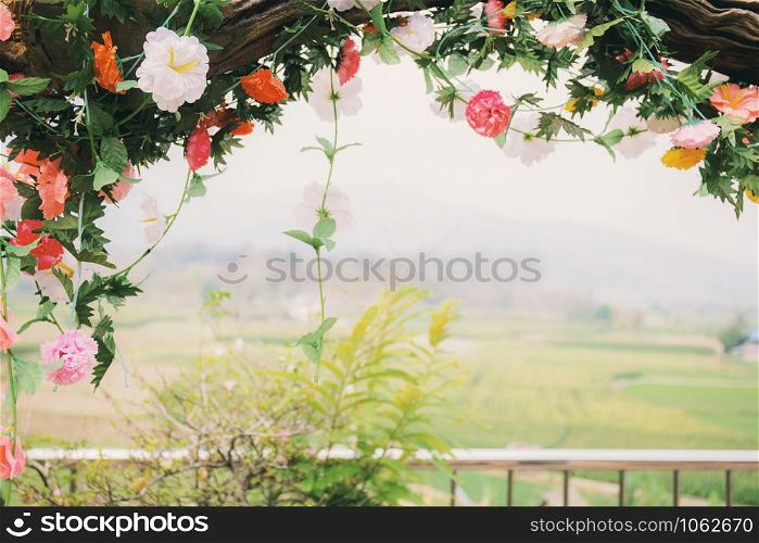 Colorful of flower with decorative on fence in garden.