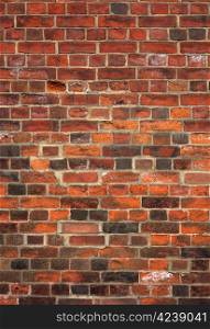 Colorful old English red brick wall background.
