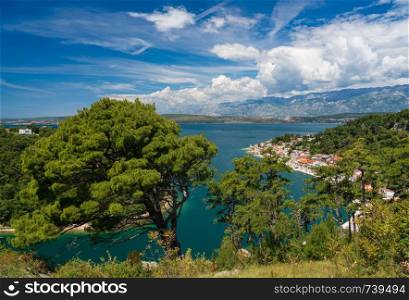 Colorful old village of Novigrad in Istria county of Croatia with blue river and harbor seen from the fortress. Picturesque small riverside town of Novigrad in Croatia