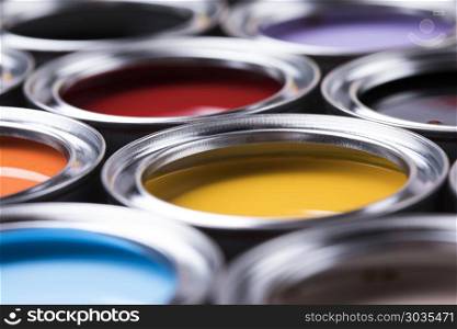 Colorful paint cans set. Full Buckets of rainbow colored oil paint