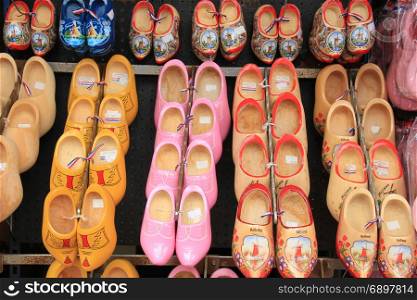 Colorful painted clogs, the traditional Dutch wooden shoes in a tourist shop