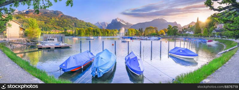 Colorful panorama with the small port of Weesen, on the lake Walensee, Switzerland, at sunset.