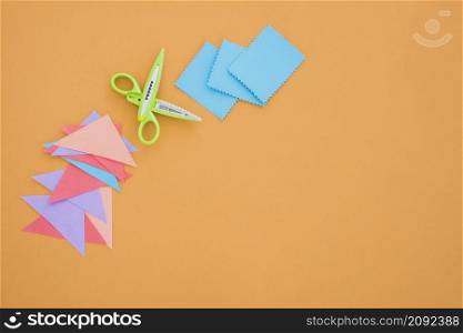 colorful paper scissor colored backdrop