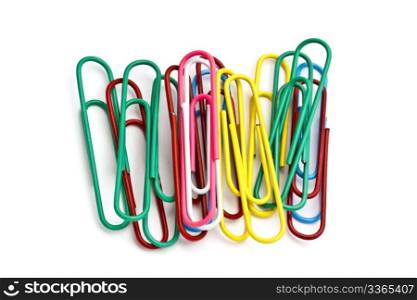 Colorful paperclips closeup on white background